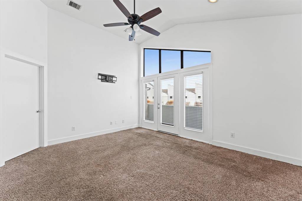 Primary bedroom with private balcony