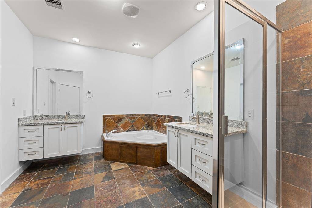 Primary Bathroom with upgraded Quartz countertops