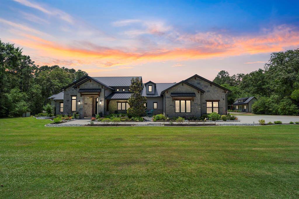 Welcome to this stunning property in Magnolia's Indigo Lake Estates.