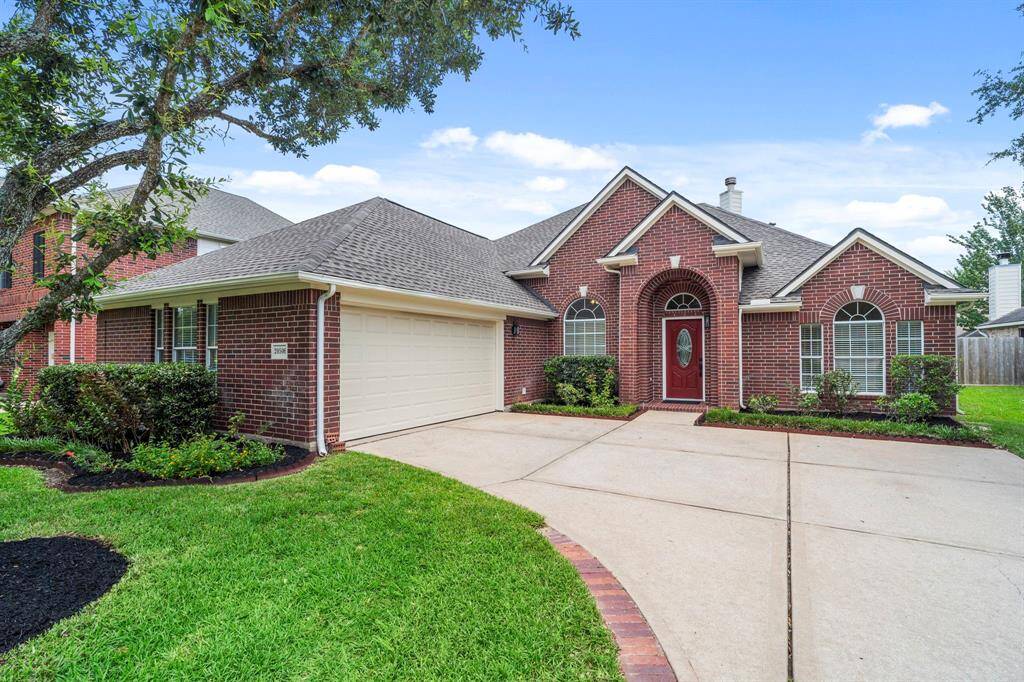 Nice size driveway with extra parking, the garage is over-sized.