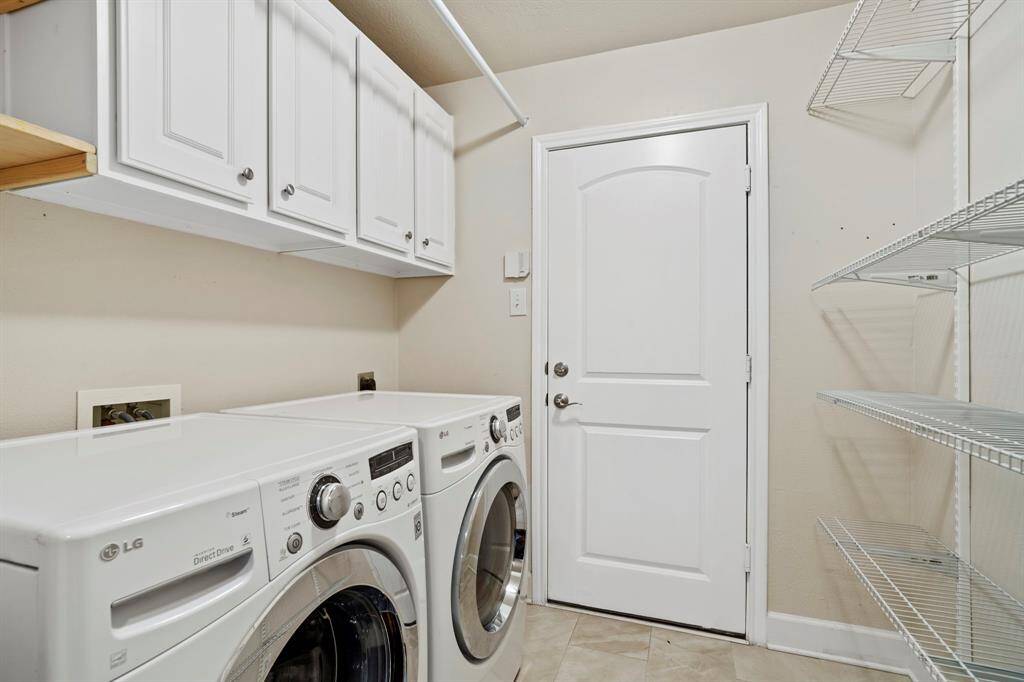 Laundry room that opens to the oversized garage.