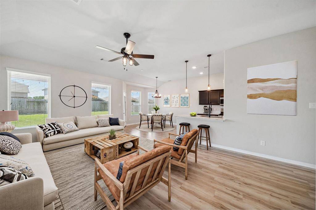 Beautifully enhanced living and dining area, showcasing modern elegance and inviting ambiance.