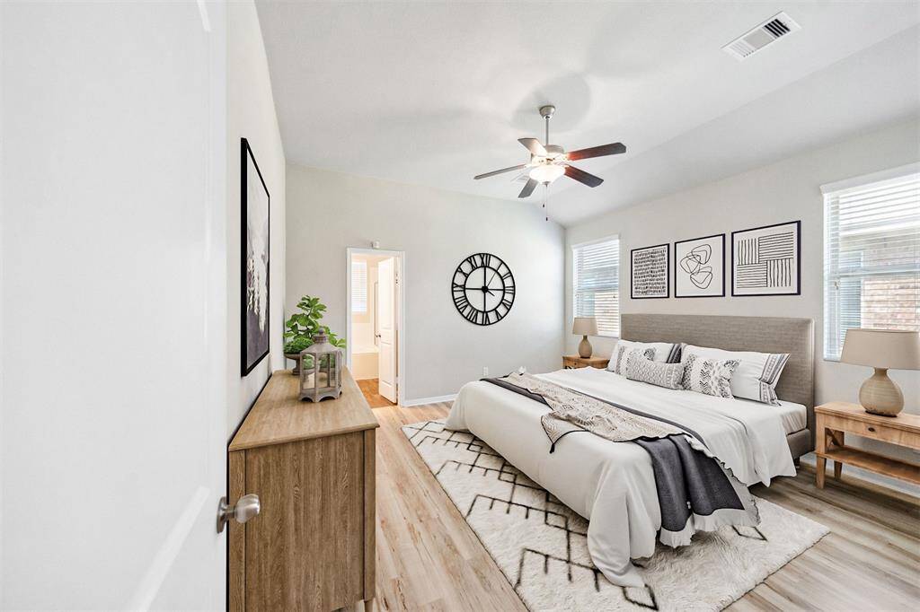 Experience the potential of your dream primary bedroom with this beautifully virtually staged space.