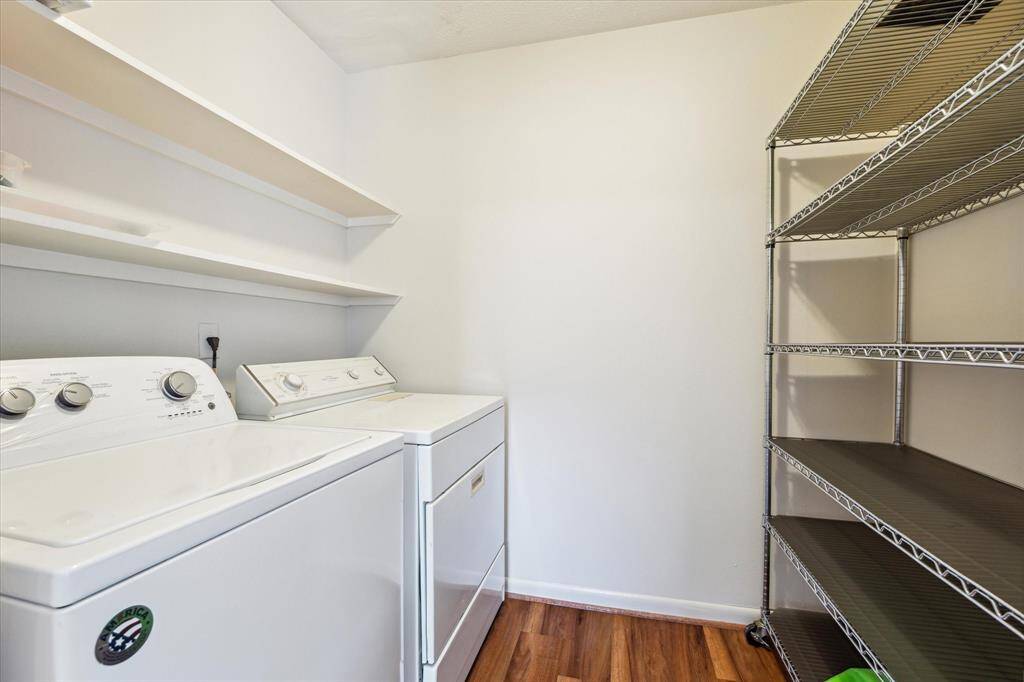 There is a utility room/pantry right off the kitchen. It is large and can comfortably house a full-sized washer and dryer.