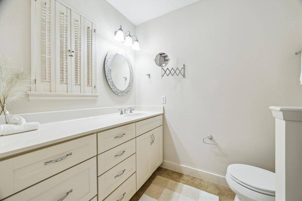Primary ensuite bathroom with fresh, neutral paint and an enlarged shower.
