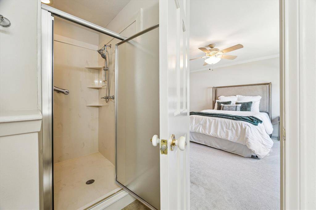 Closeup of the enlarged shower, showing how close it is to the primary bedroom.