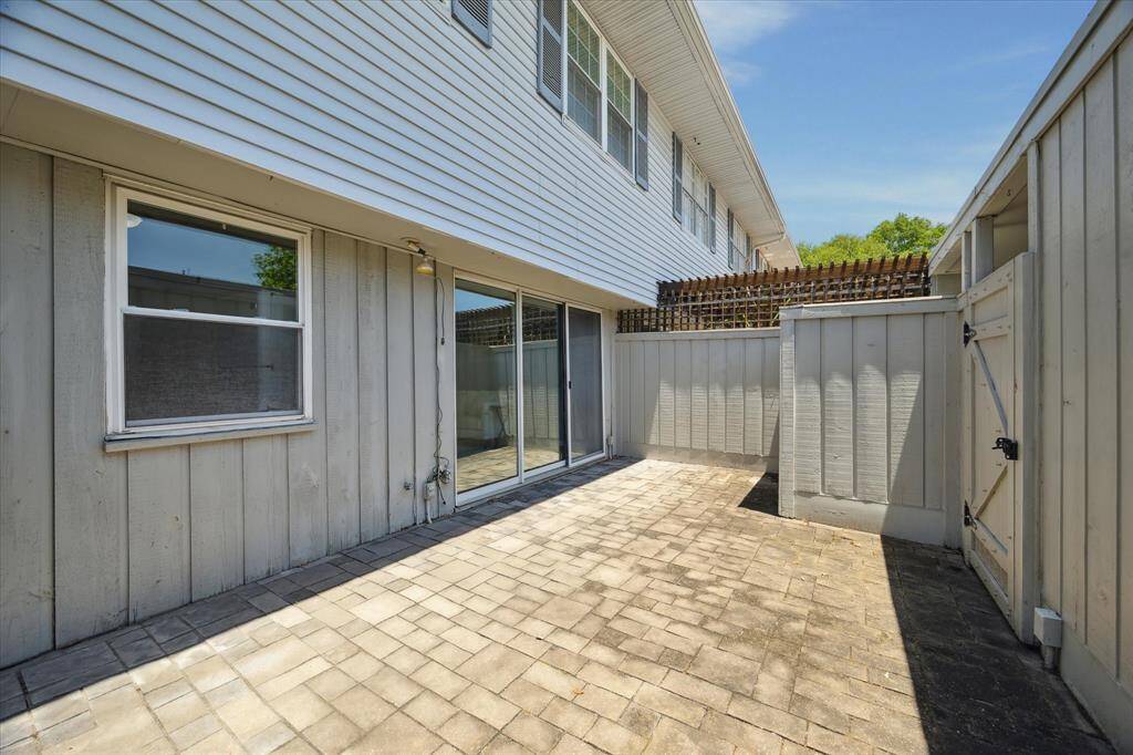 One of the best features of this home is the large pavered patio located right off the den and leading into the garage. It’s a perfect place for grilling or just enjoying a relaxing evening.
