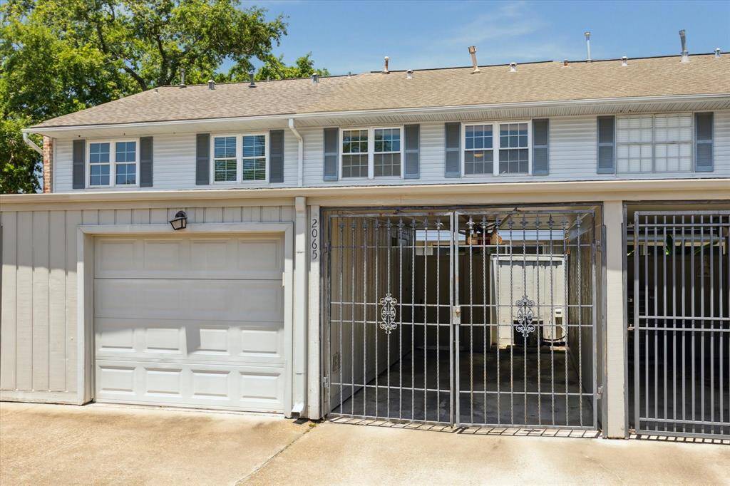 This unit features one attached garage that is remote controlled, and the unit also has an additional secure parking/carport area.