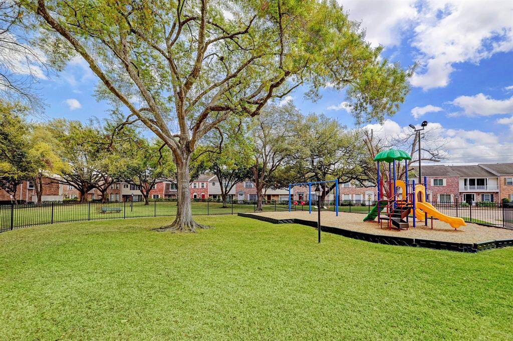A wonderful park with lots of trees, playground areas, and everything well maintained.