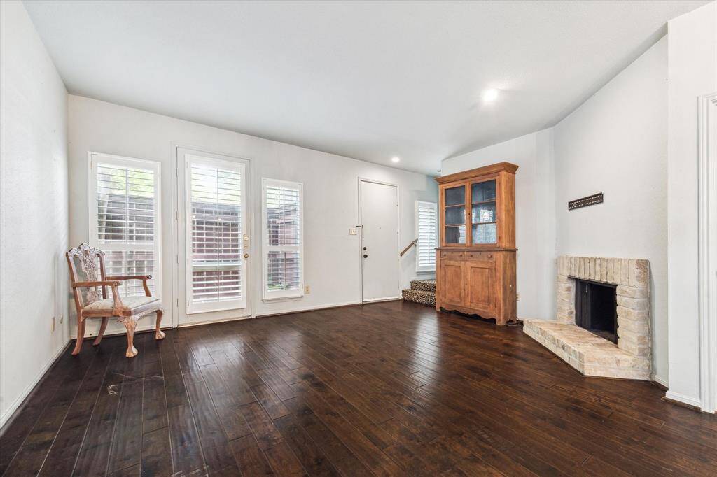 Family Room - Spacious family room with updated flooring and fireplace.