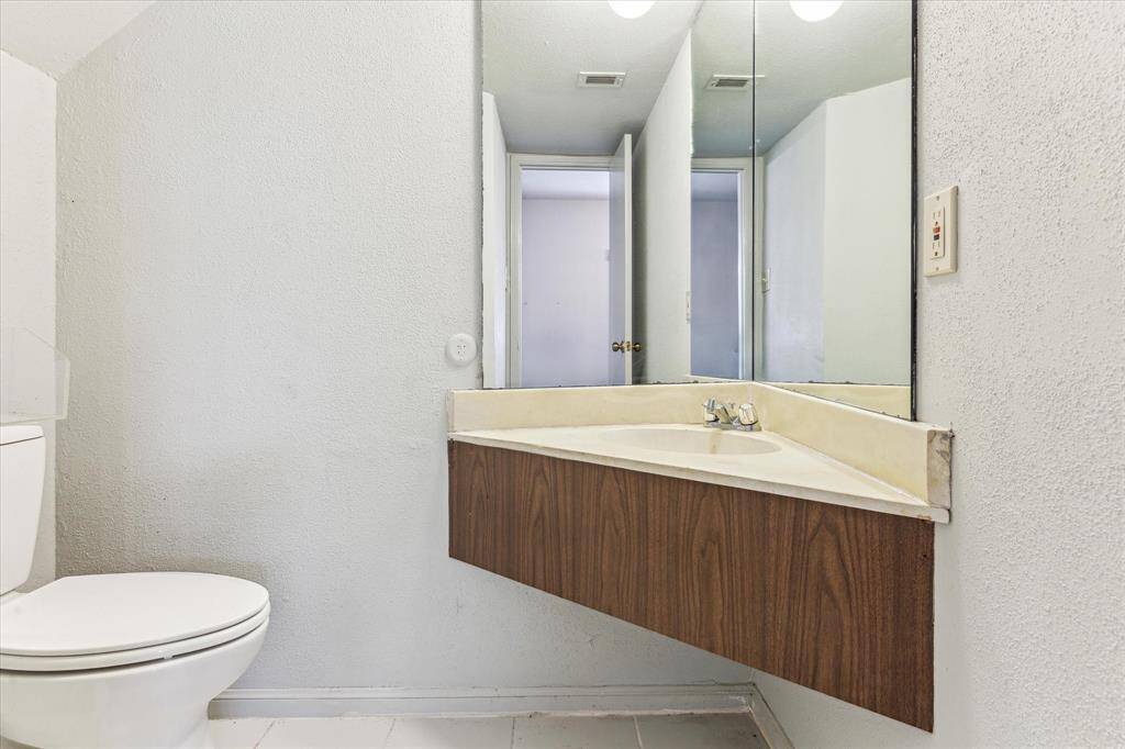Half Bath - Located off of the family room on the first floor.