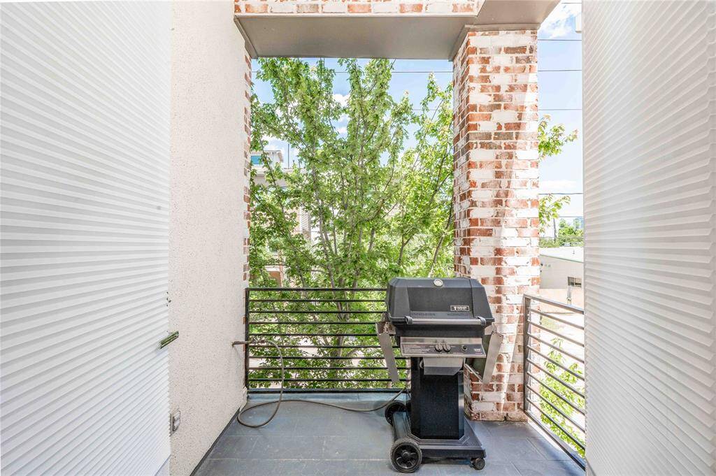 Balcony off main living equipped with gas for convenient grilling.
