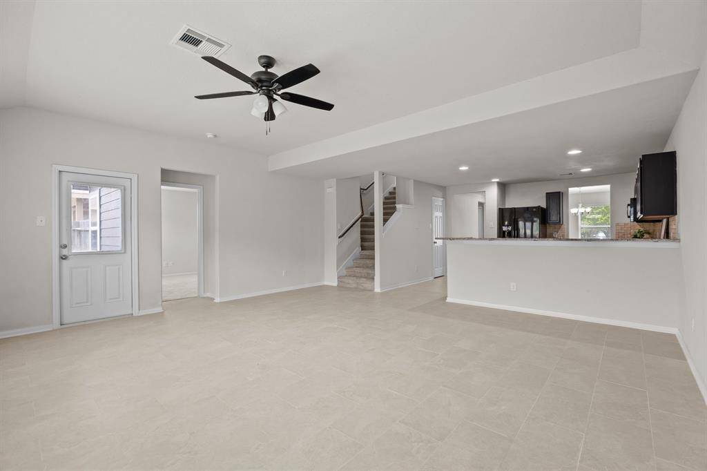 Open Concept to kitchen and entry to backyard