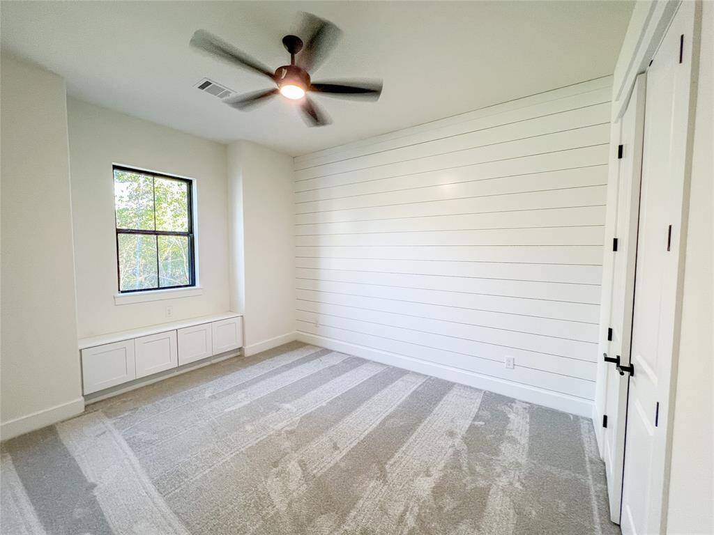 Example of previously Built Hallmark Builder's Home Plan. Shiplap wall and built in window storage are upgrades that can be added. Many Upgraded Features Included in Specifications. Please inquire with Hallmark Builder's Sales Team for included specifications. Personalize Selections Now!