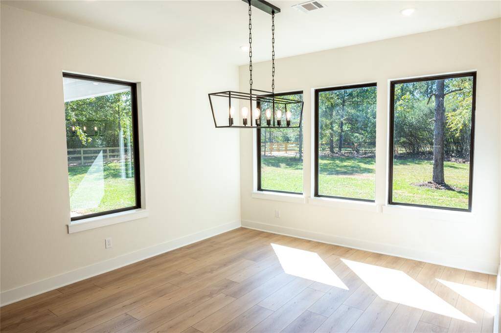 Example of previously Built Hallmark Builder's Home Dining Area. Many Upgraded Features Included in Specifications. Please inquire with Hallmark Builder's Sales Team for included specifications. Personalize Selections Now!