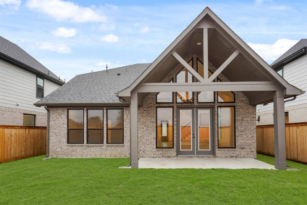 Expansive backyard with full sprinkler system, gutters, french drains, and lush grass!