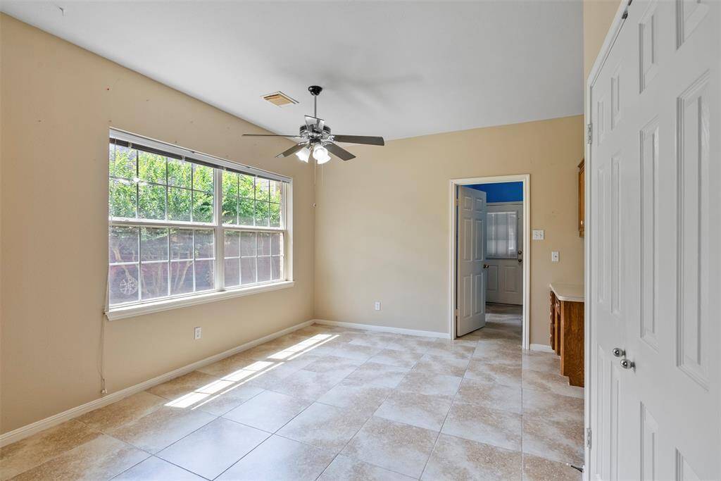 Large breakfast area leads into laundry area.