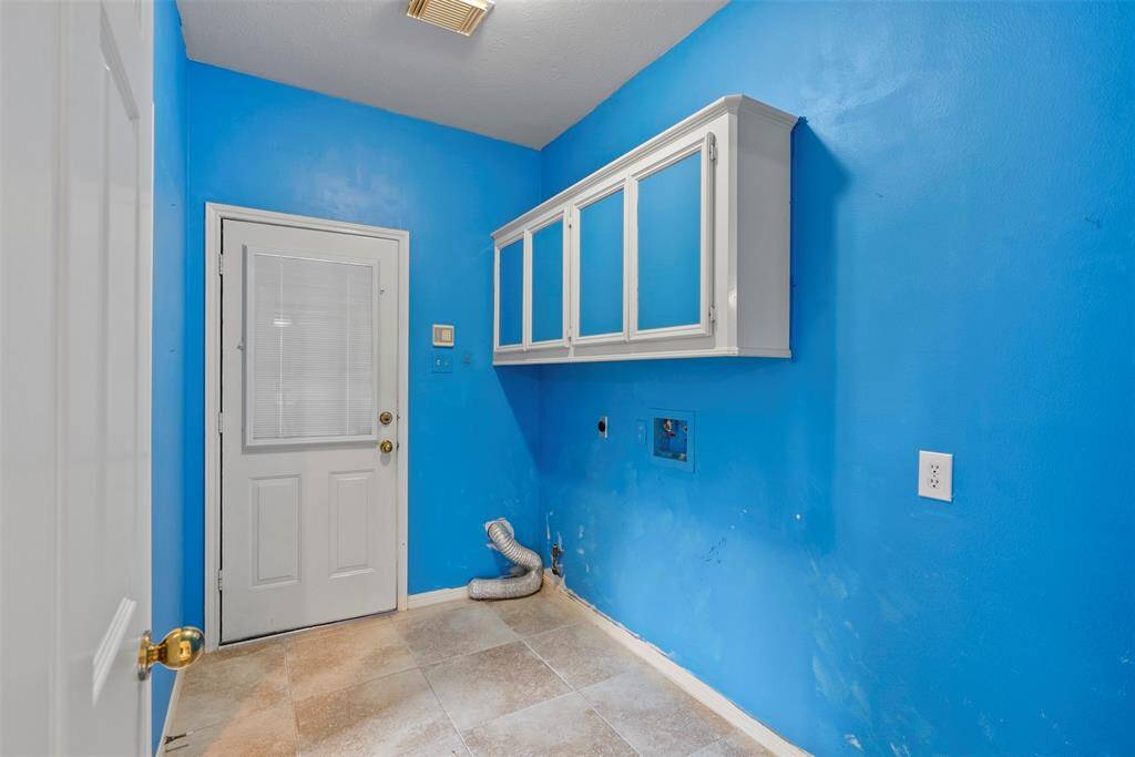 The laundry room is spacious.