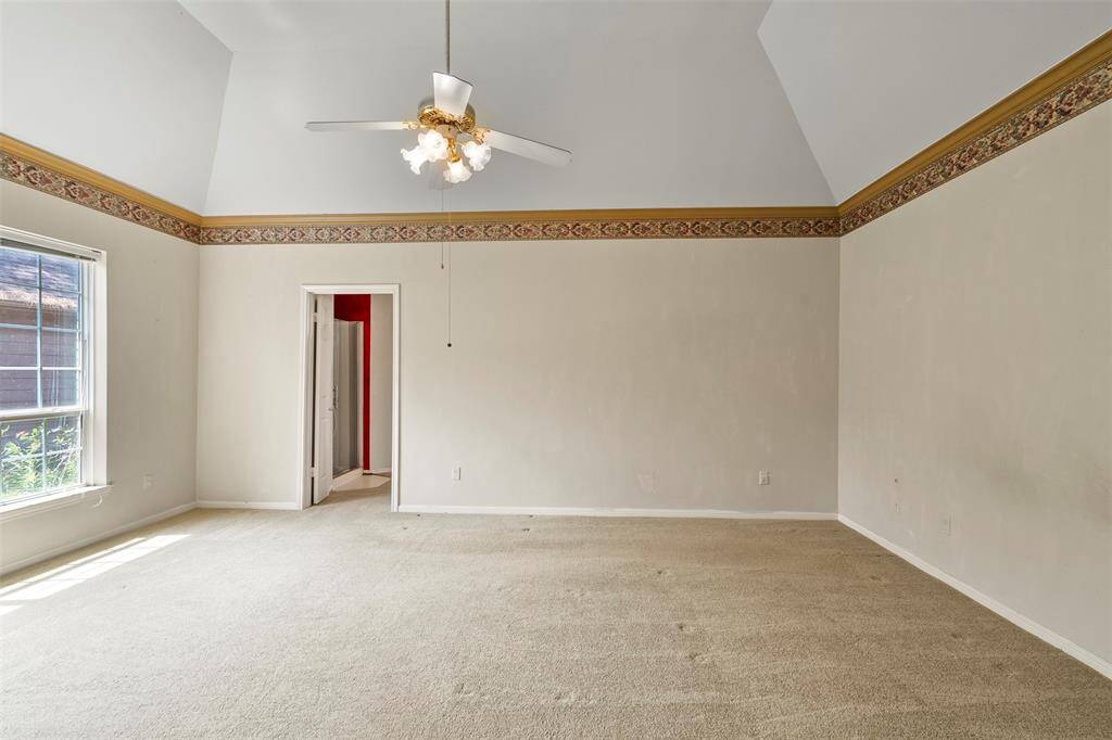 Primary bedroom has a high ceiling creating an even more spacious feel.