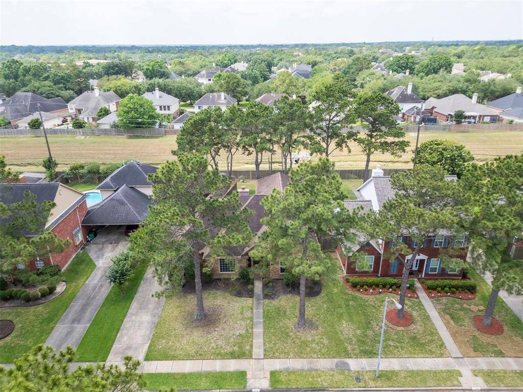 Mature trees offer this home plenty of shade.