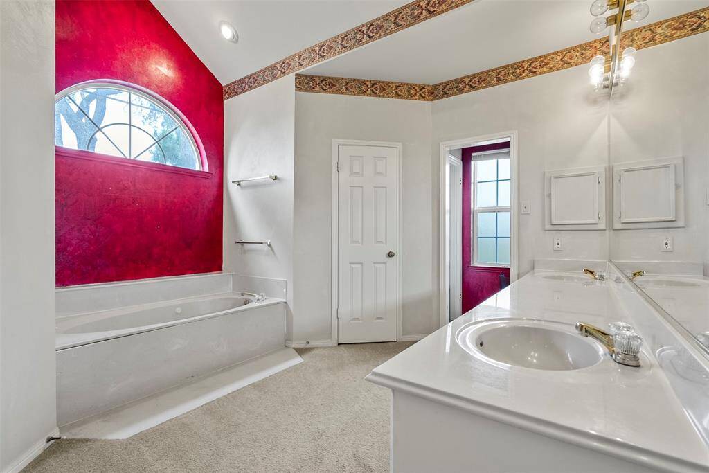 Beautiful primary bath is ready for your special touch.