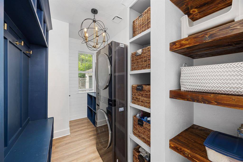 You will not be lacking storage in this updated laundry room