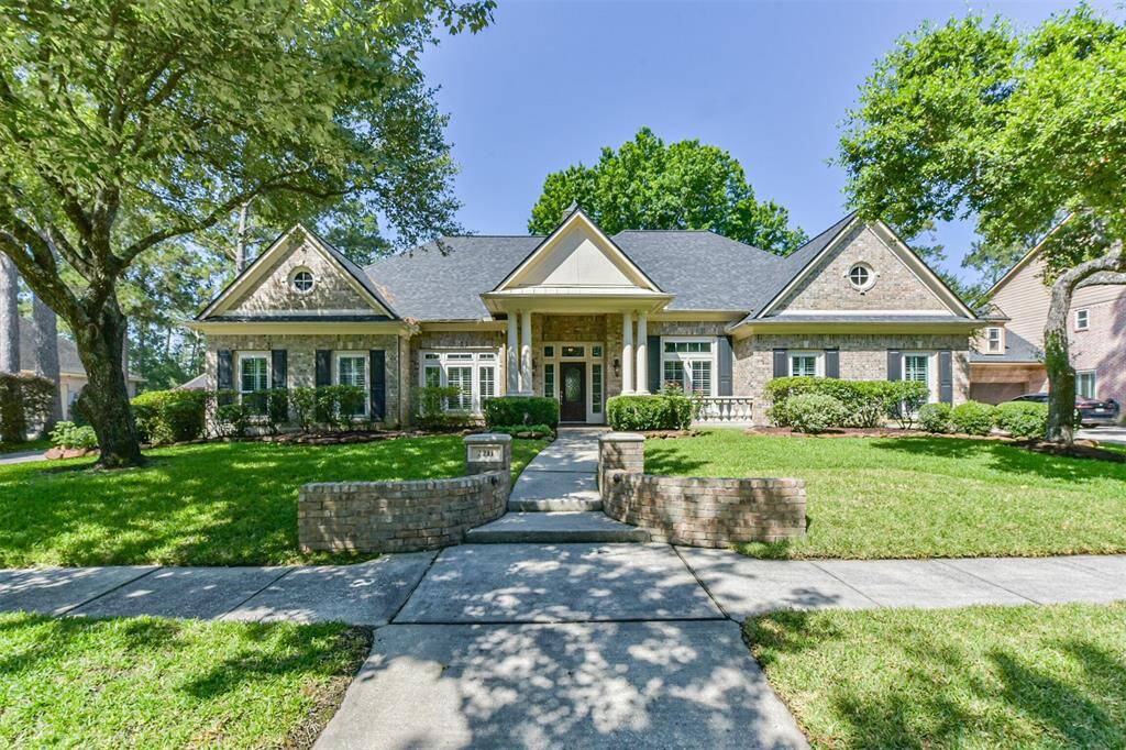 Beautiful and stately single-story brick home with a spacious front lawn, mature trees, and a welcoming entrance. The property features a symmetrical design with dormer windows and a central walkway leading to the front door. Ideal for those seeking a classic and serene neighborhood setting. The "American Dream" home!