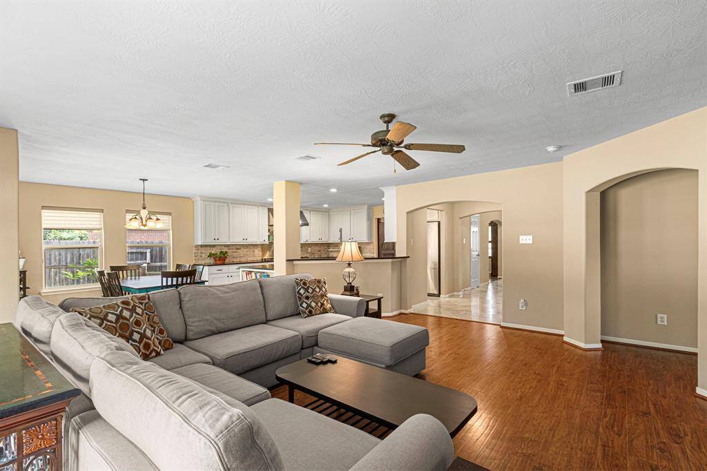Enjoy effortless interaction in the heart of the home, where the family room opens directly to the kitchen and breakfast nook--perfect for keeping everyone connected while cooking, dining, or relaxing.