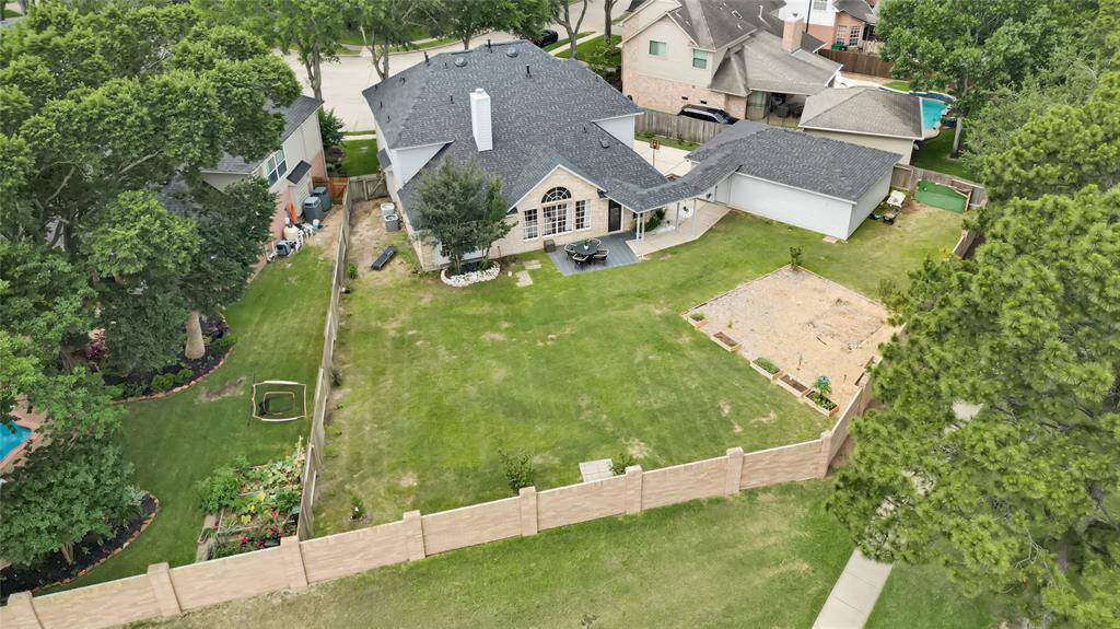 Aerial view highlights the expansive backyard.