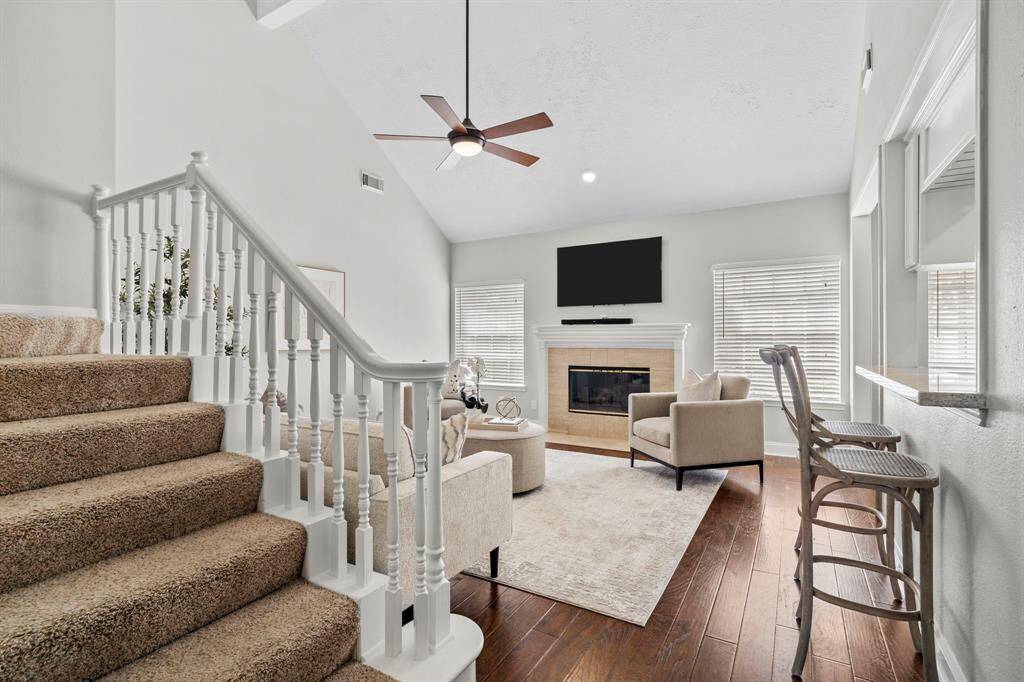 The open layout connects the family room to the staircase and upstairs living, making it the perfect central gathering space for both everyday comfort and special occasions.
