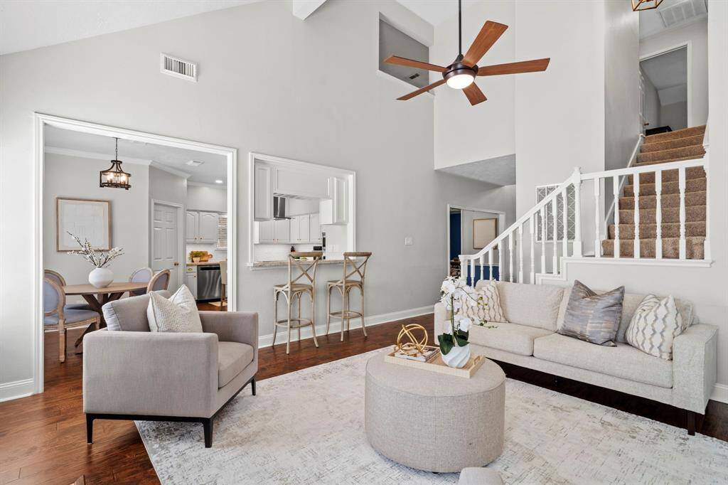 A seamless flow leads from the family room into the casual dining area and kitchen, with a convenient breakfast bar offering additional seating for casual meals or conversation.