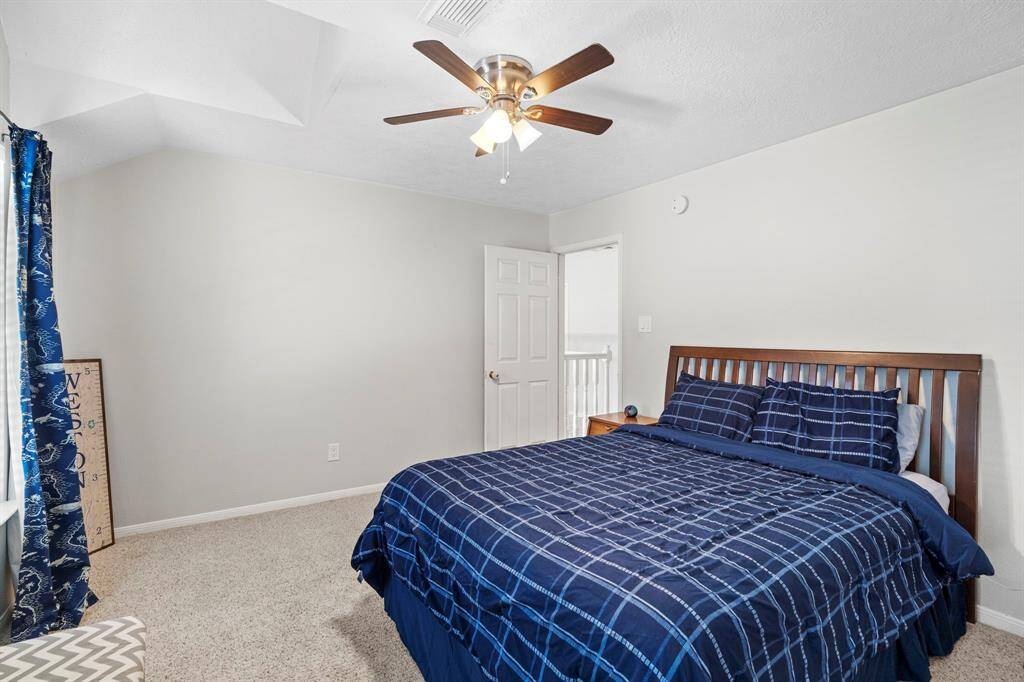 Here is yet another spacious guest retreat with plush carpeting, dual windows, and plenty of room for a full bedroom suite or creative use.