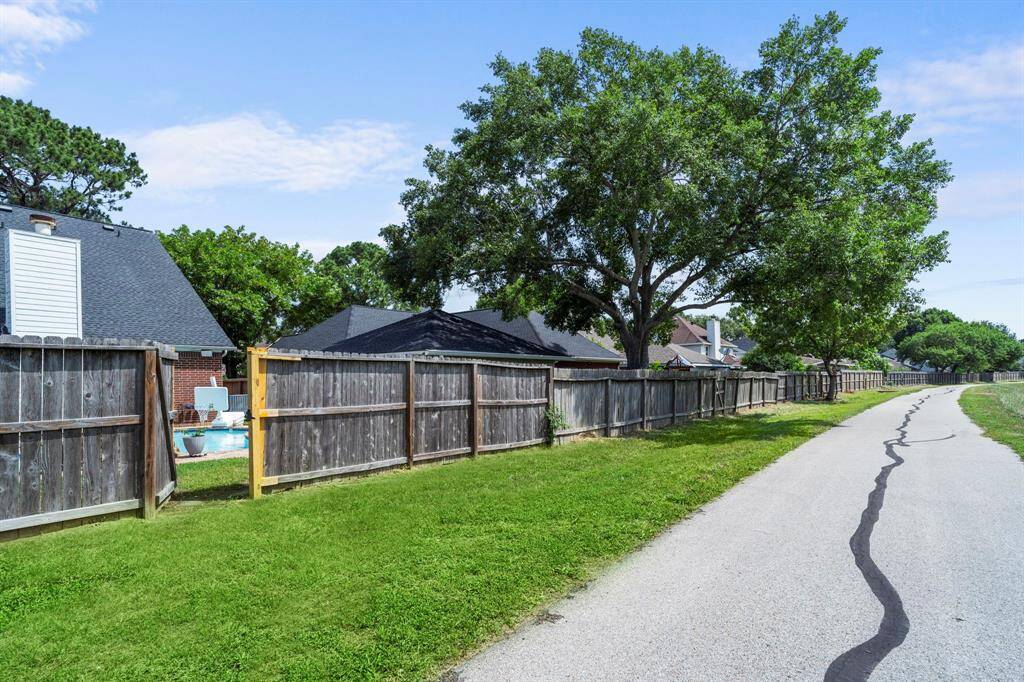 Enjoy direct access to the scenic greenbelt and paved walking trail right from your backyard—perfect for morning strolls, bike rides, or peaceful evening walks.