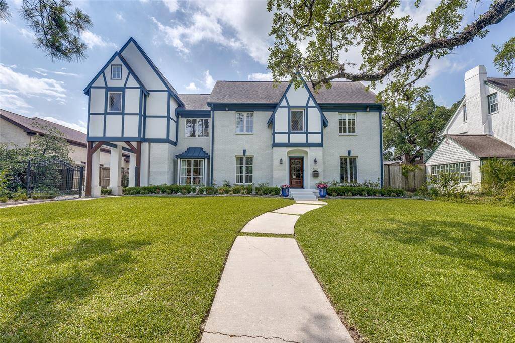 Tudor style home with curb appeal within walking distance of Old Braeswood Park, Roberts Elementary School, and the Medical Center.