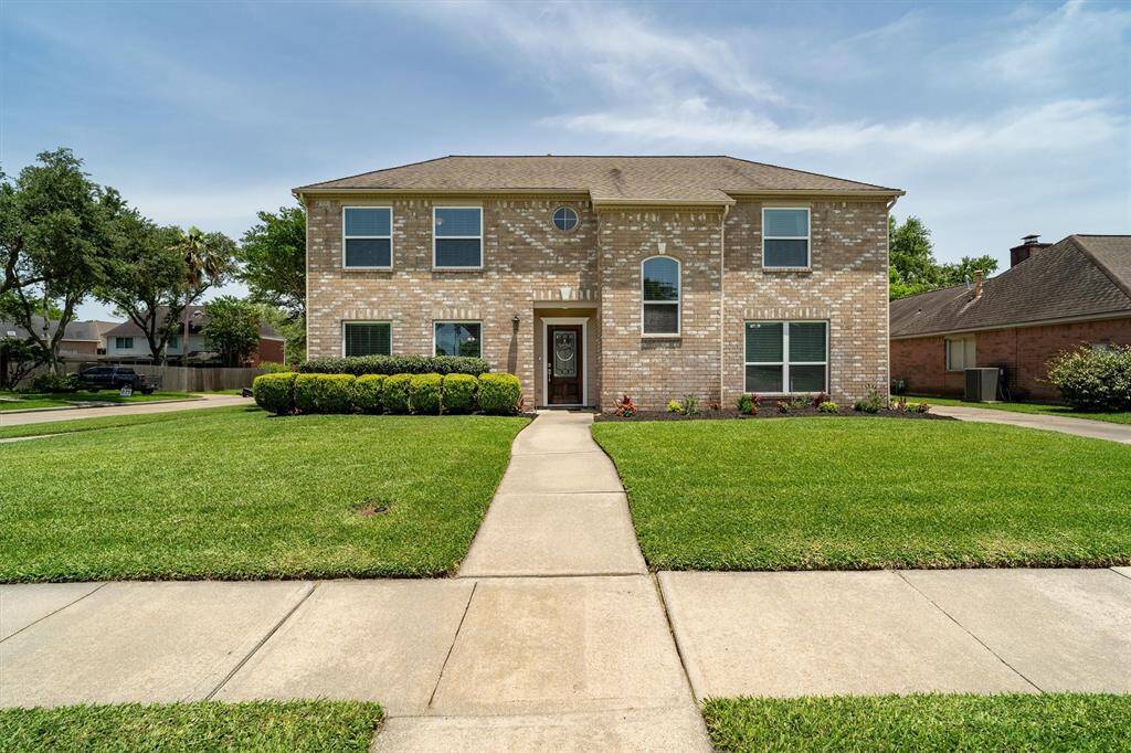 Beautiful 4/2.1/2 on a corner lot located in the gated section of South Shore Harbor!