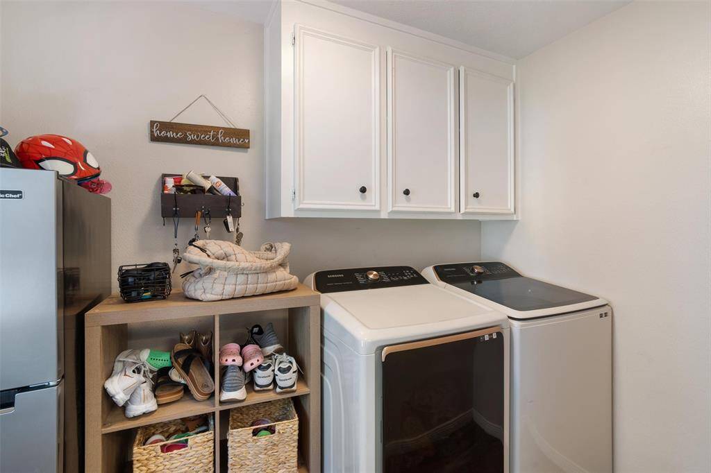 Mud room/laundry room with overhead storage and barn door!