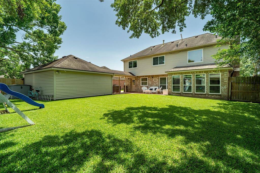 Great yard for kids, pets, and entertaining!