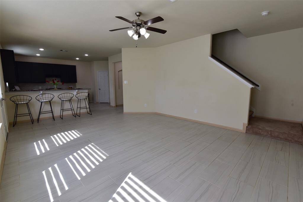 SPACIOUS FAMILY ROOM.