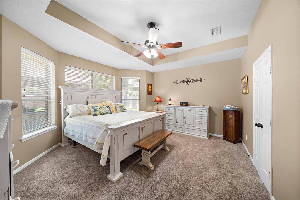 Oversized Primary bedroom with lots of space.