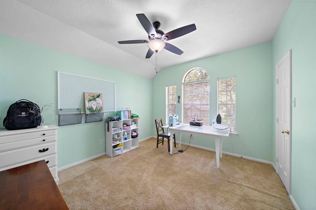 Secondary Bedroom w/Walk-in closet is being used as a craft & Sewing Room