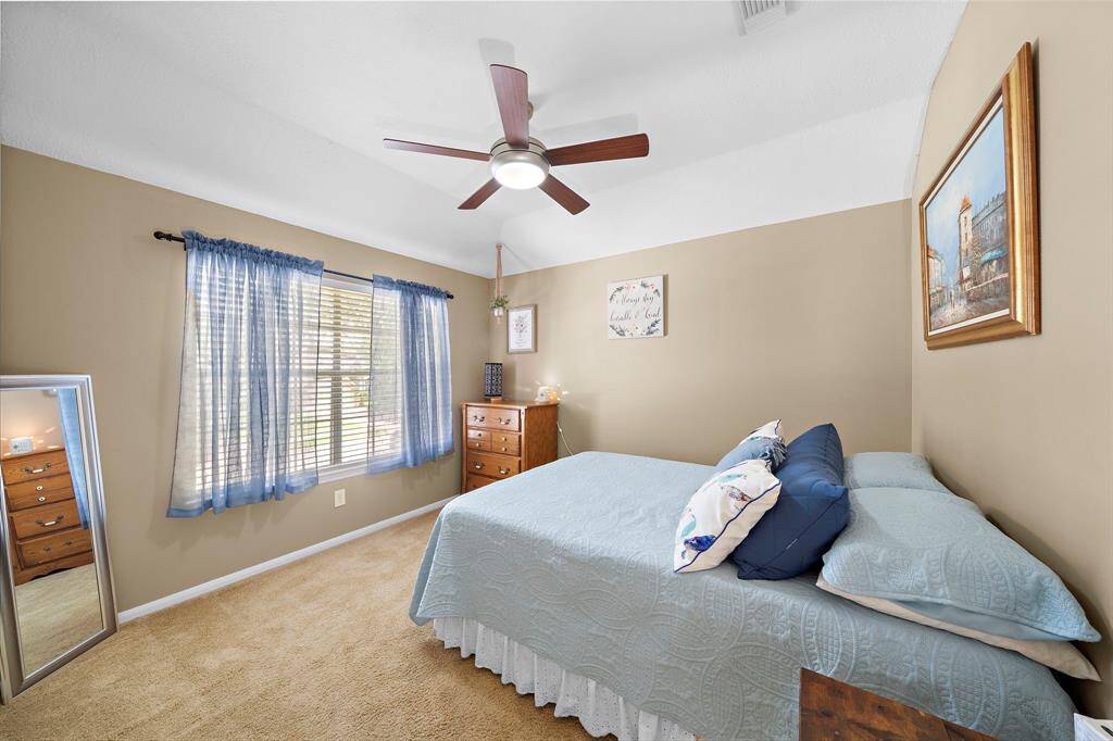 The Third Secondary upstairs bedroom also with its own walk in closet.