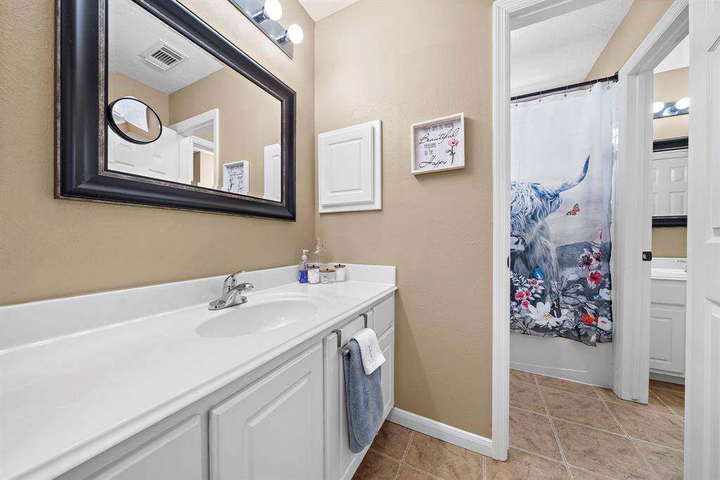 One side of the Jack & Jill Style Bathroom