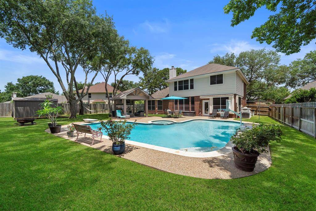A view from the back fence to a perspective of How Large and Spacious this Outdoor Oasis is.
