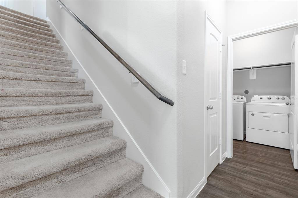 View of Stairs and Utility Room