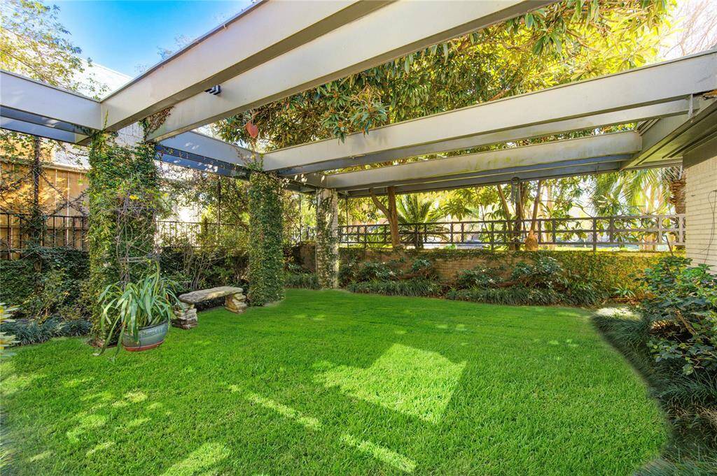 Virtually reimagined front courtyard. if you prefer a safe grassy area for children or pets,  this garden can easily be transformed! Irrigation already in place and can be expanded or existing pavers can be replaced with eco-friendly turf.
