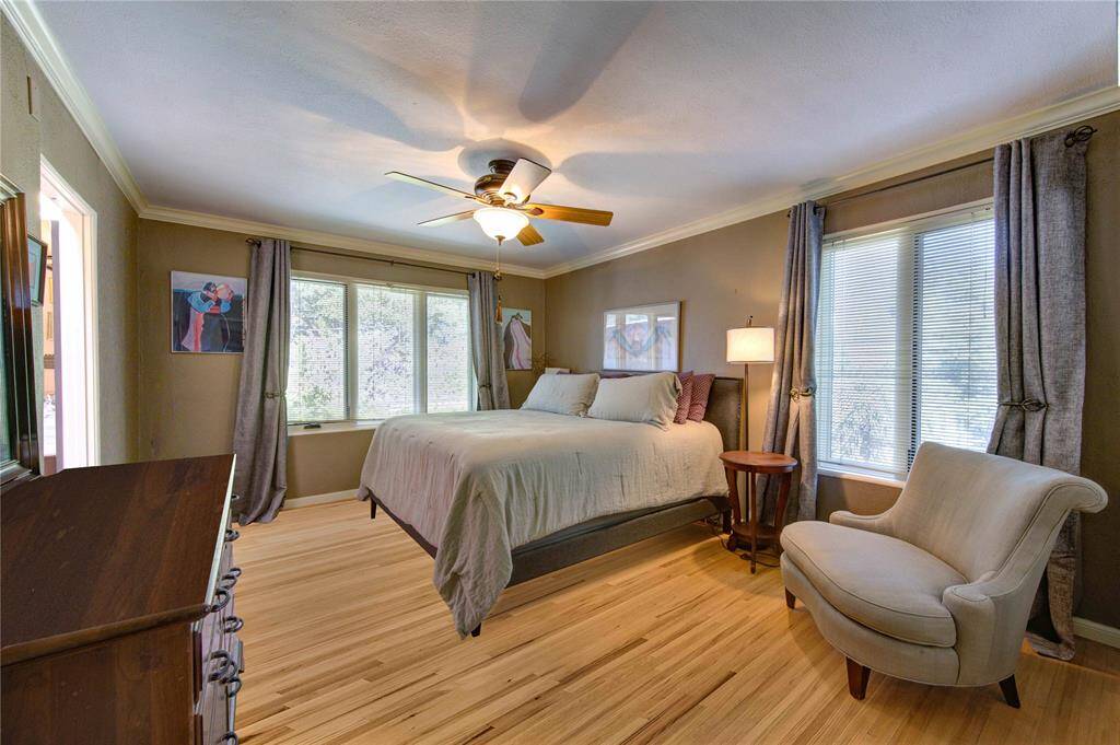 Secondary bedroom at the top of the stairs, shares a Hollywood bath with third bedroom.  West and south light.