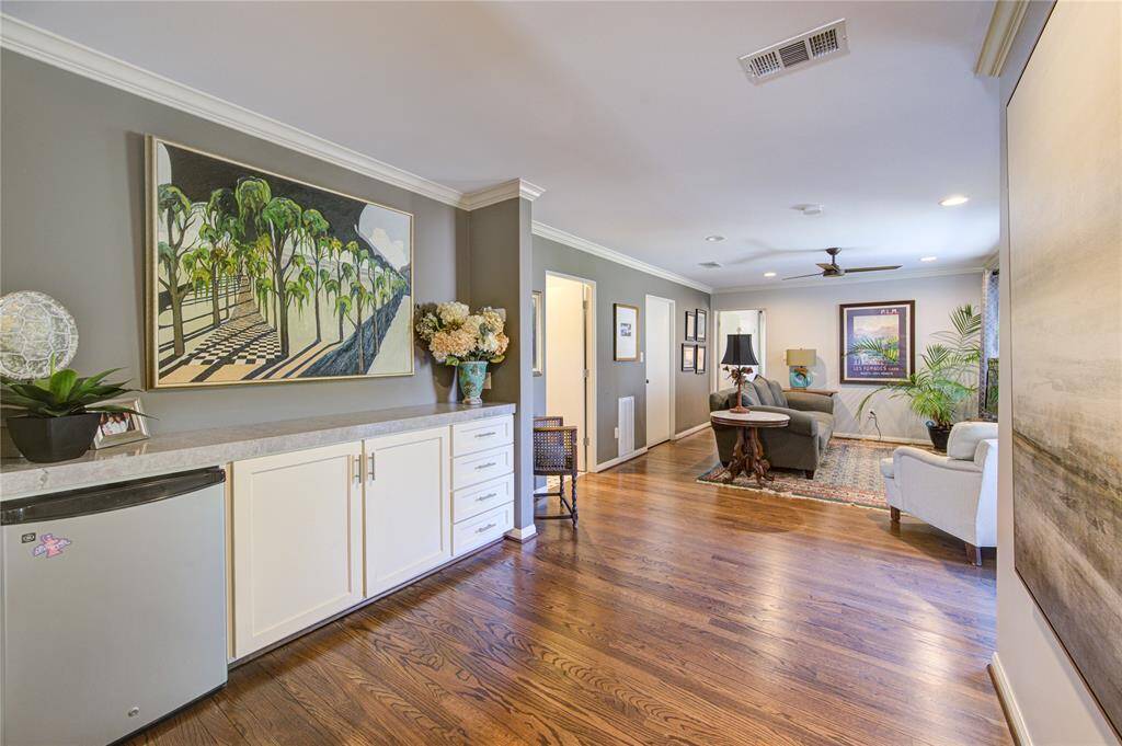Part of the expansion of the home included the addition of the snack back here with beverage fridge, serving bar and added storage for games, snacks and more.