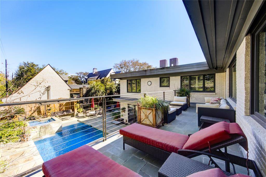 Largest of the three balconies, this is located off the second floor den and enjoys views over the pool while still being privately screened off from the neighbors. Sun exposure to the east and north.