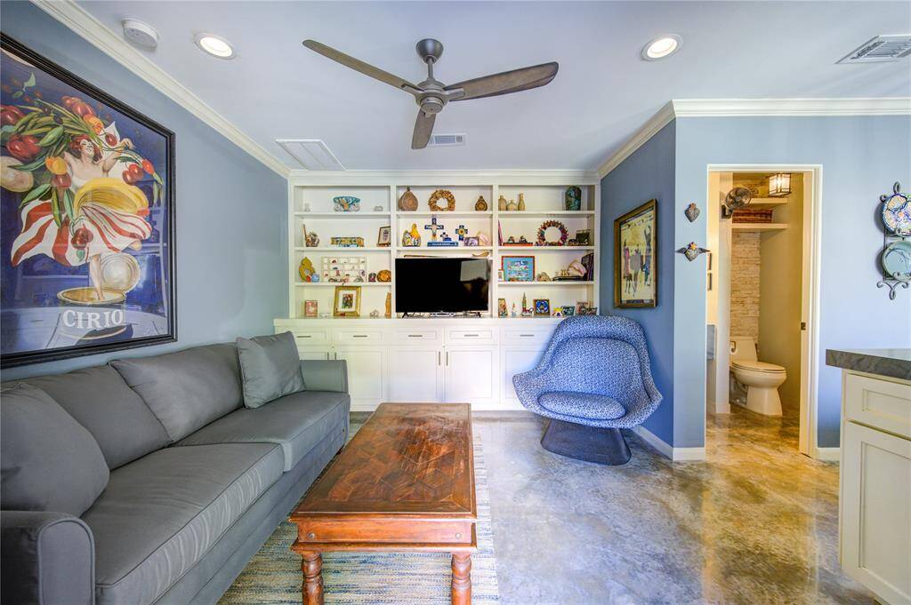 Casita with polished concrete flooring, essentials built-in, full bathroom with step in shower and kitchenette.