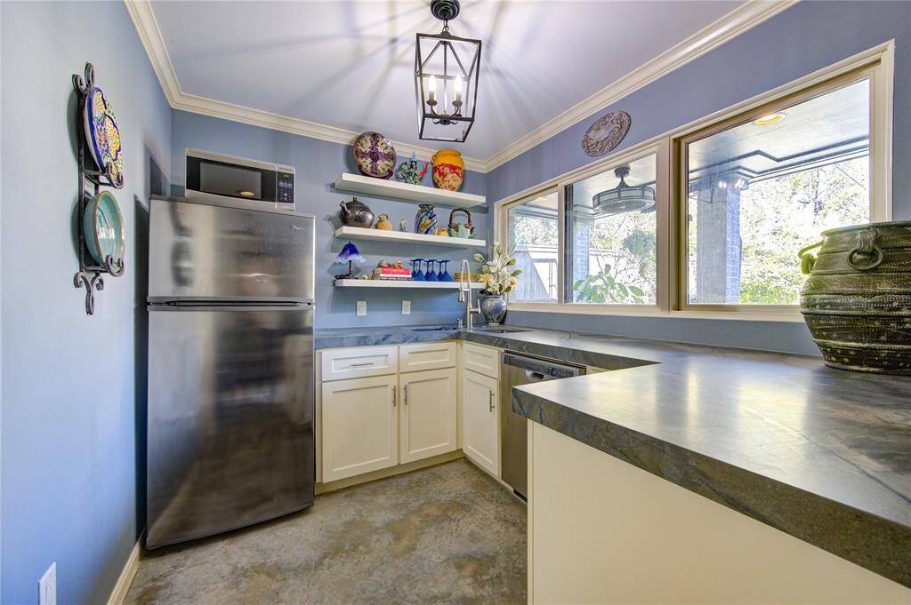 Kitchenette is the prefect spot for prepping items for the outdoor grill located directly off the slider windows, great for passing items, serving and clean up.